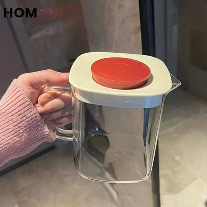 Brew & Sip: Transparent Glass Tea Cup with Integrated Infuser & Handle